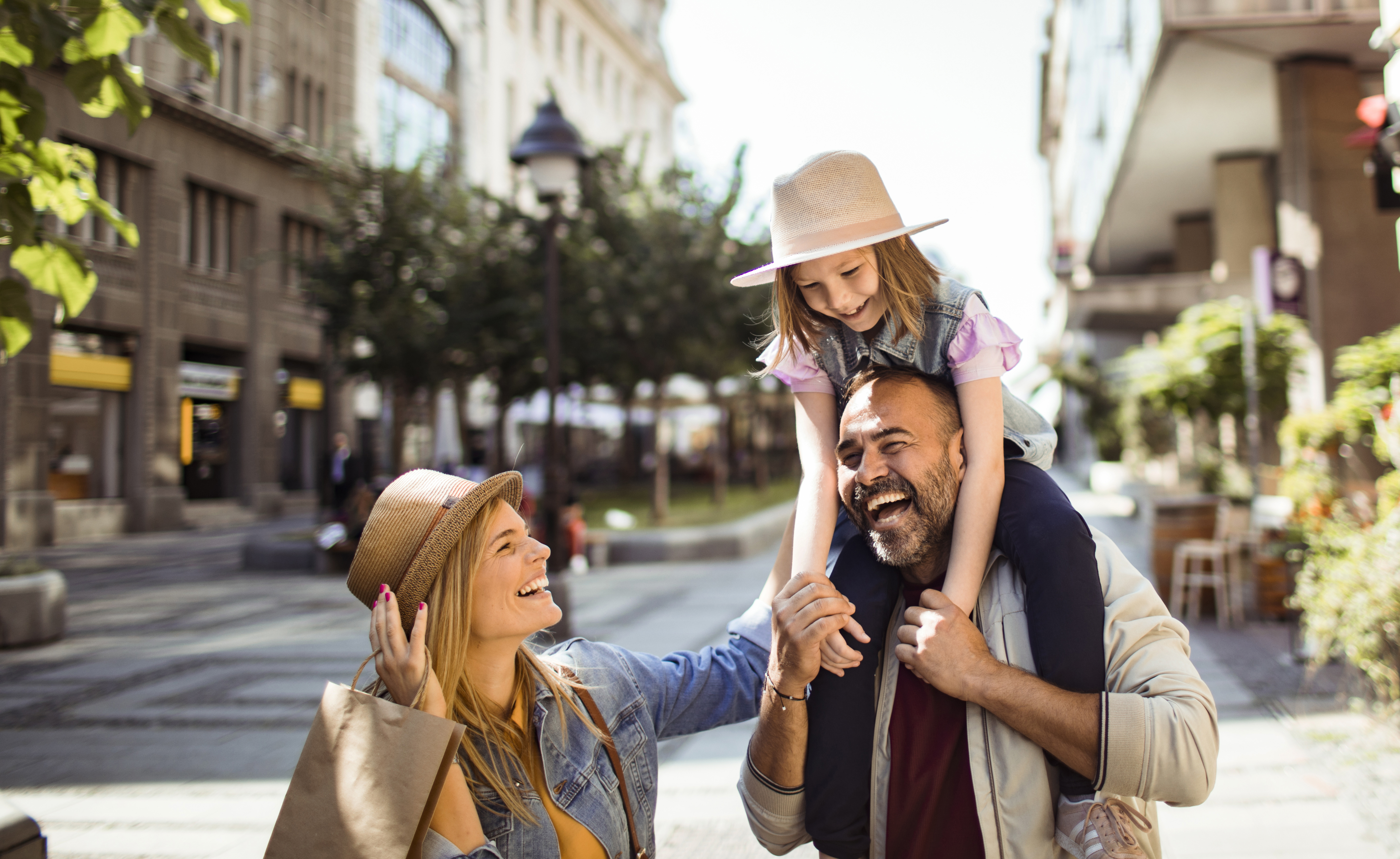 Close up of a family shopping in the city